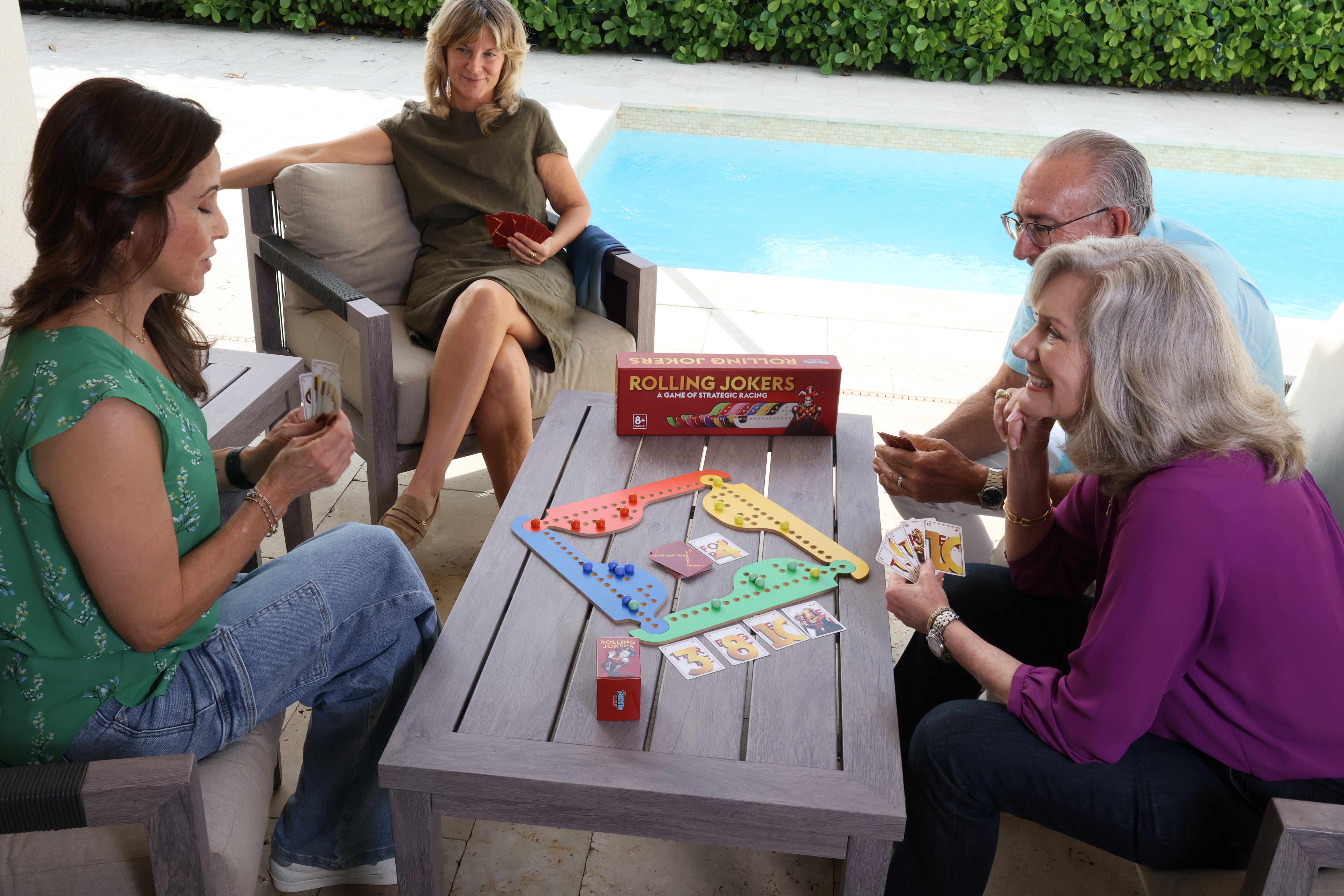 family enjoying rolling jokers board game